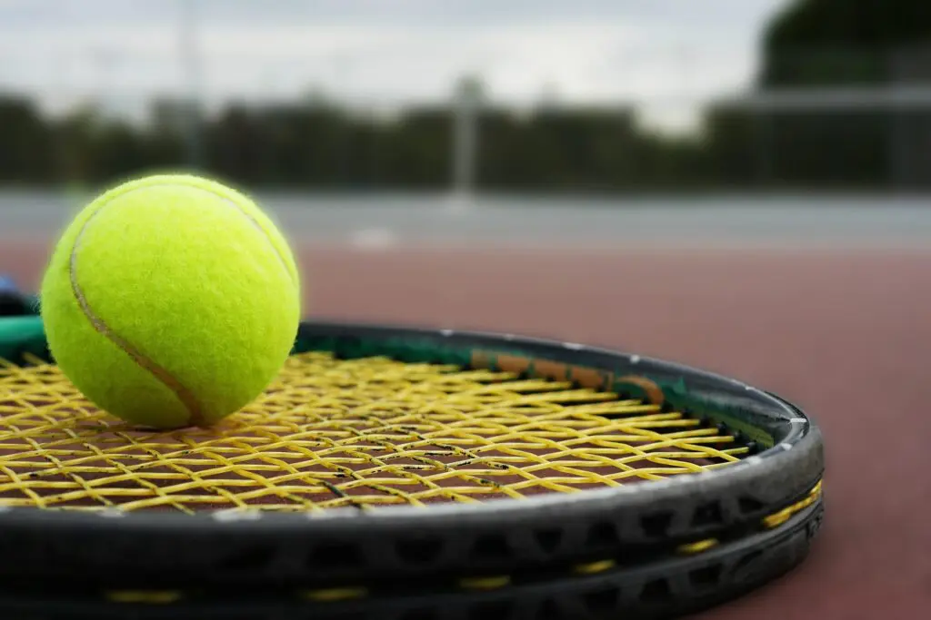 a tennis ball on a racket