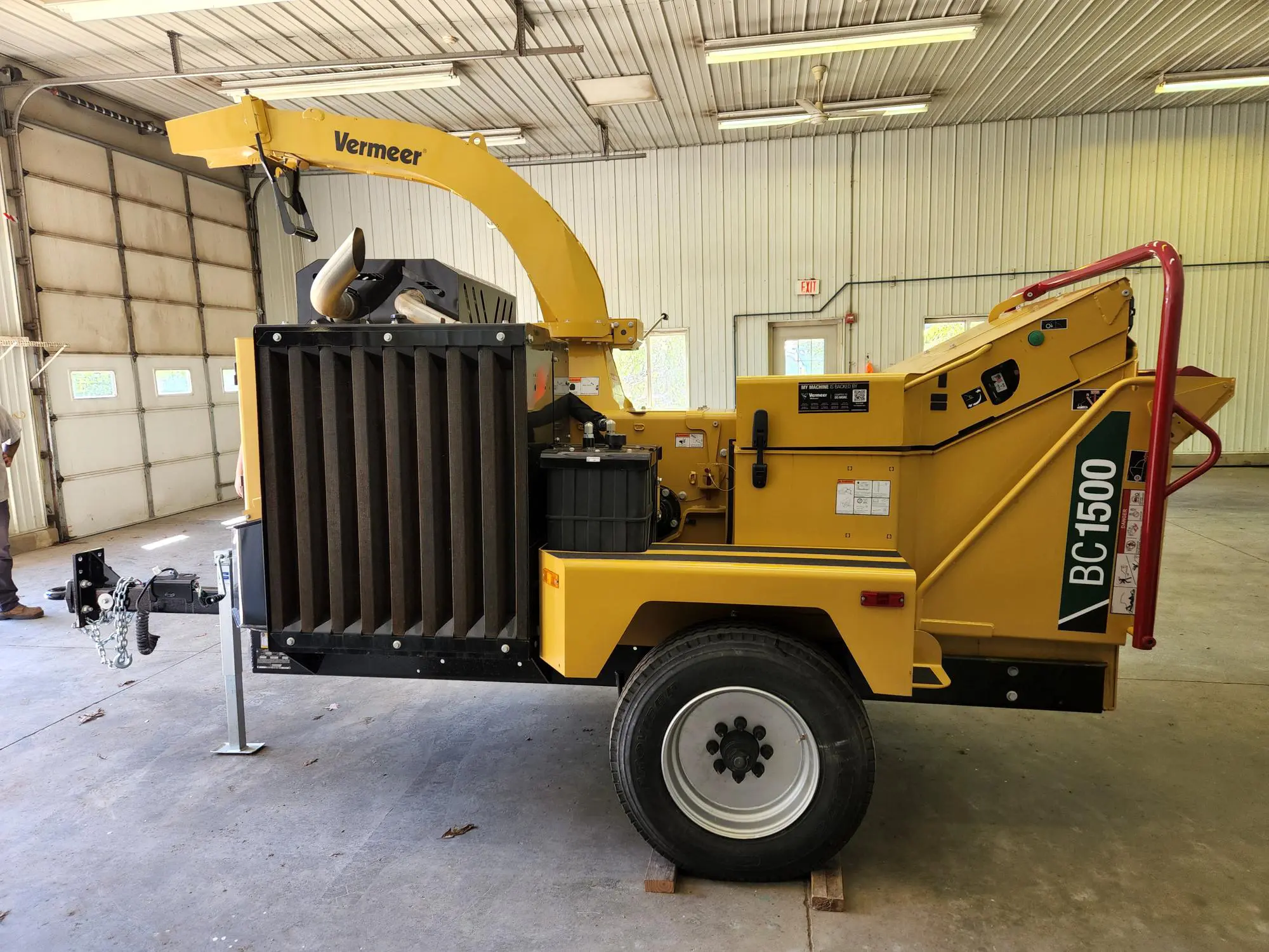 a yellow machine in a building