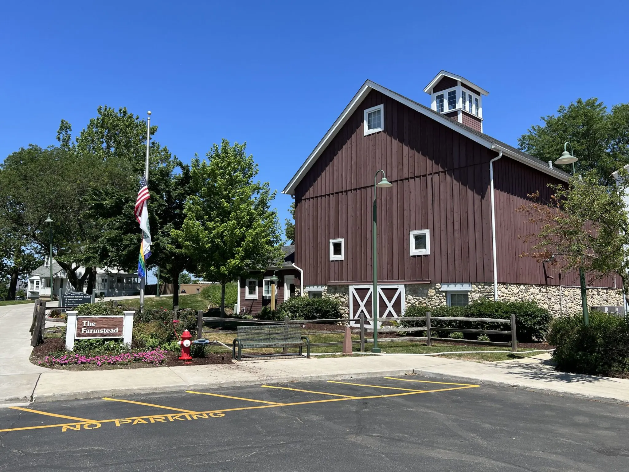 a building with a flag pole in front of it