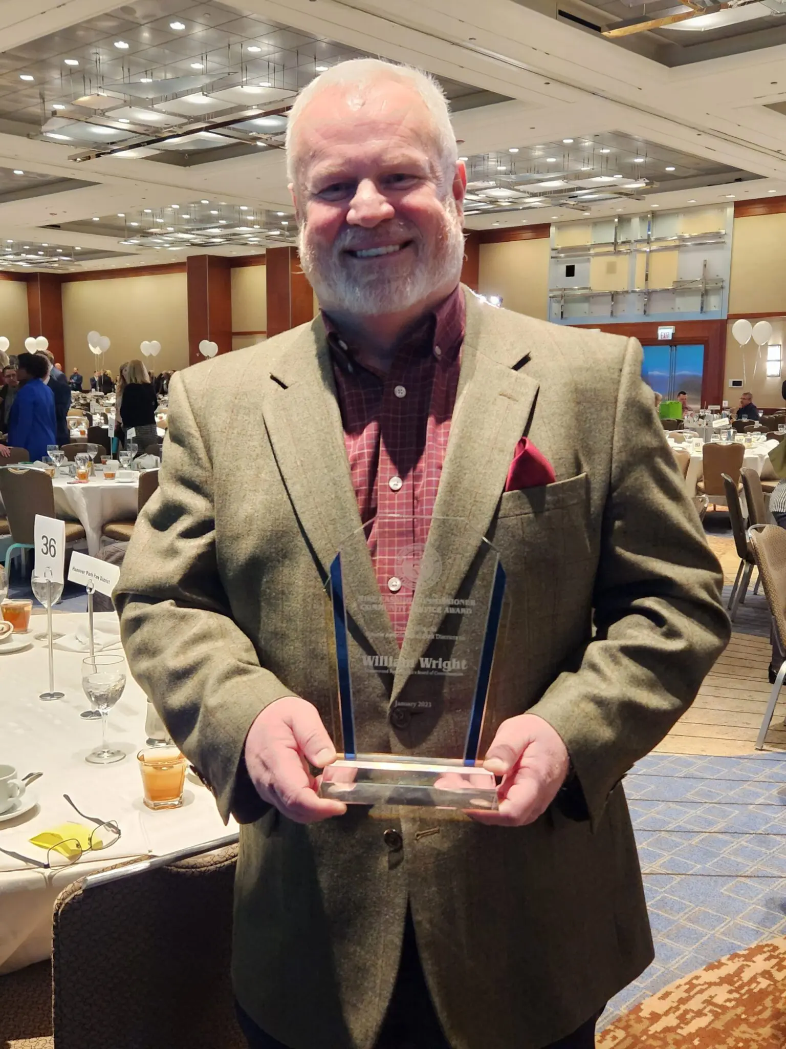 a person holding a trophy
