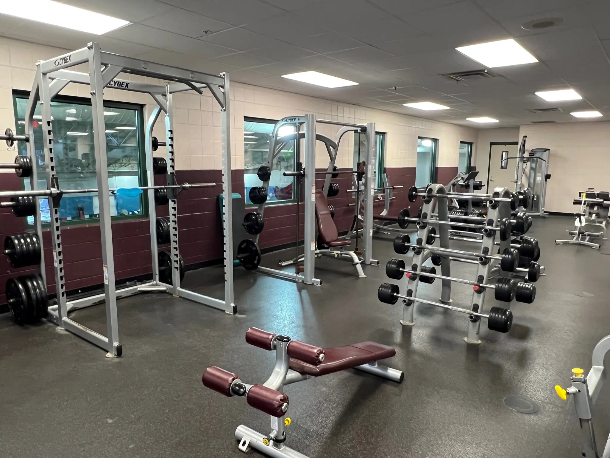 a gym with weights and equipment