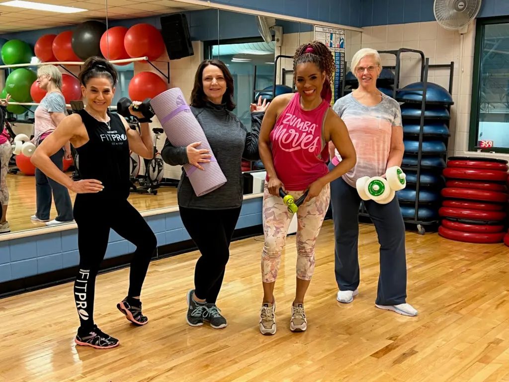 a group of women in a gym