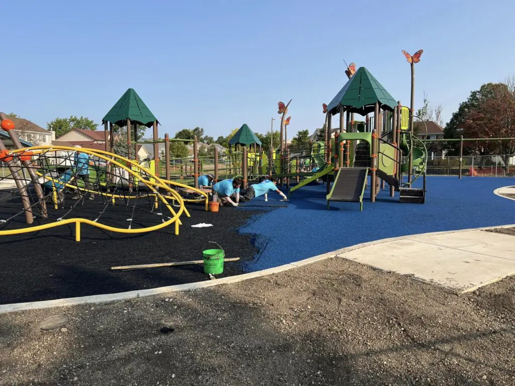 a group of people playing on a playground
