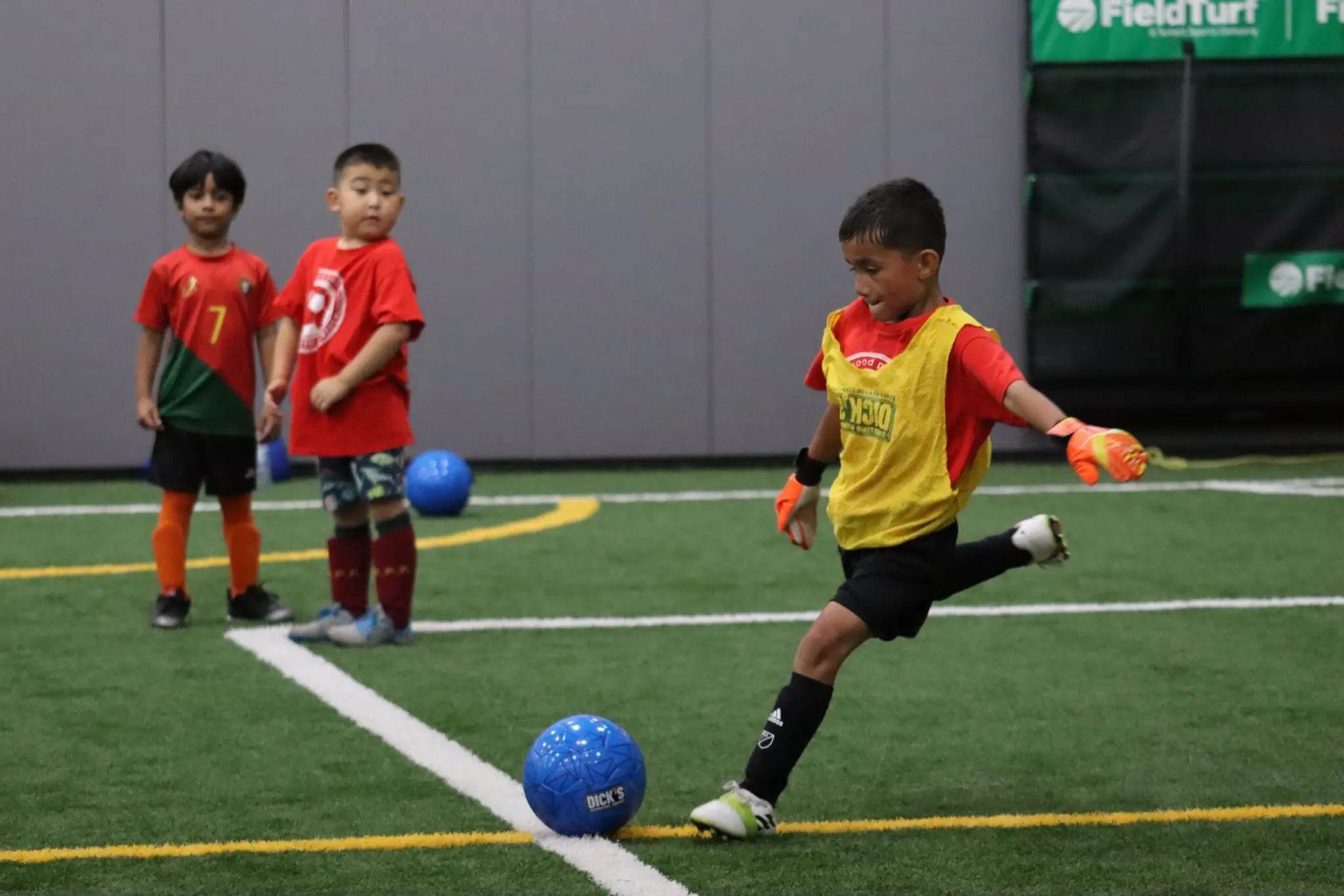 a group of kids playing football