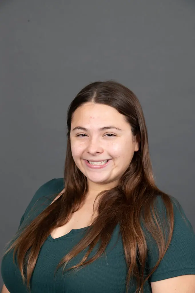 a person smiling at camera