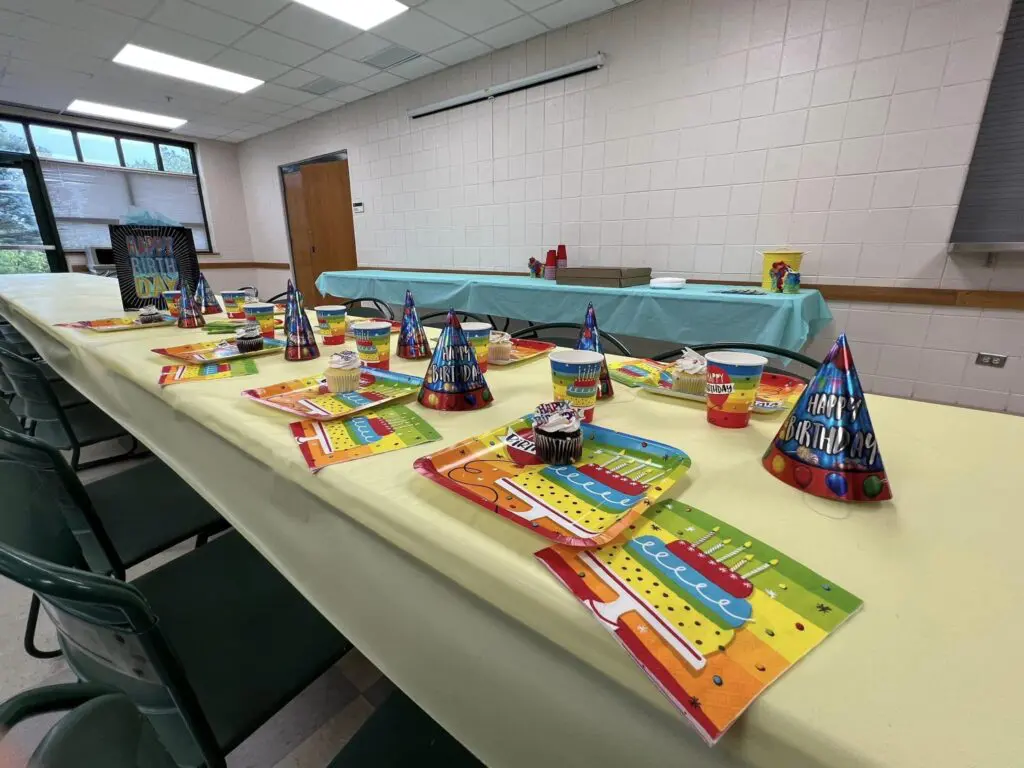 a table with plates and cups on it