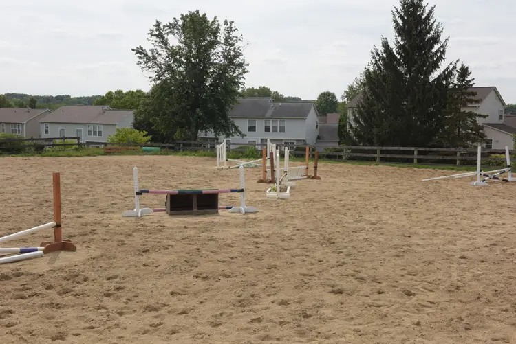a horse arena with obstacles