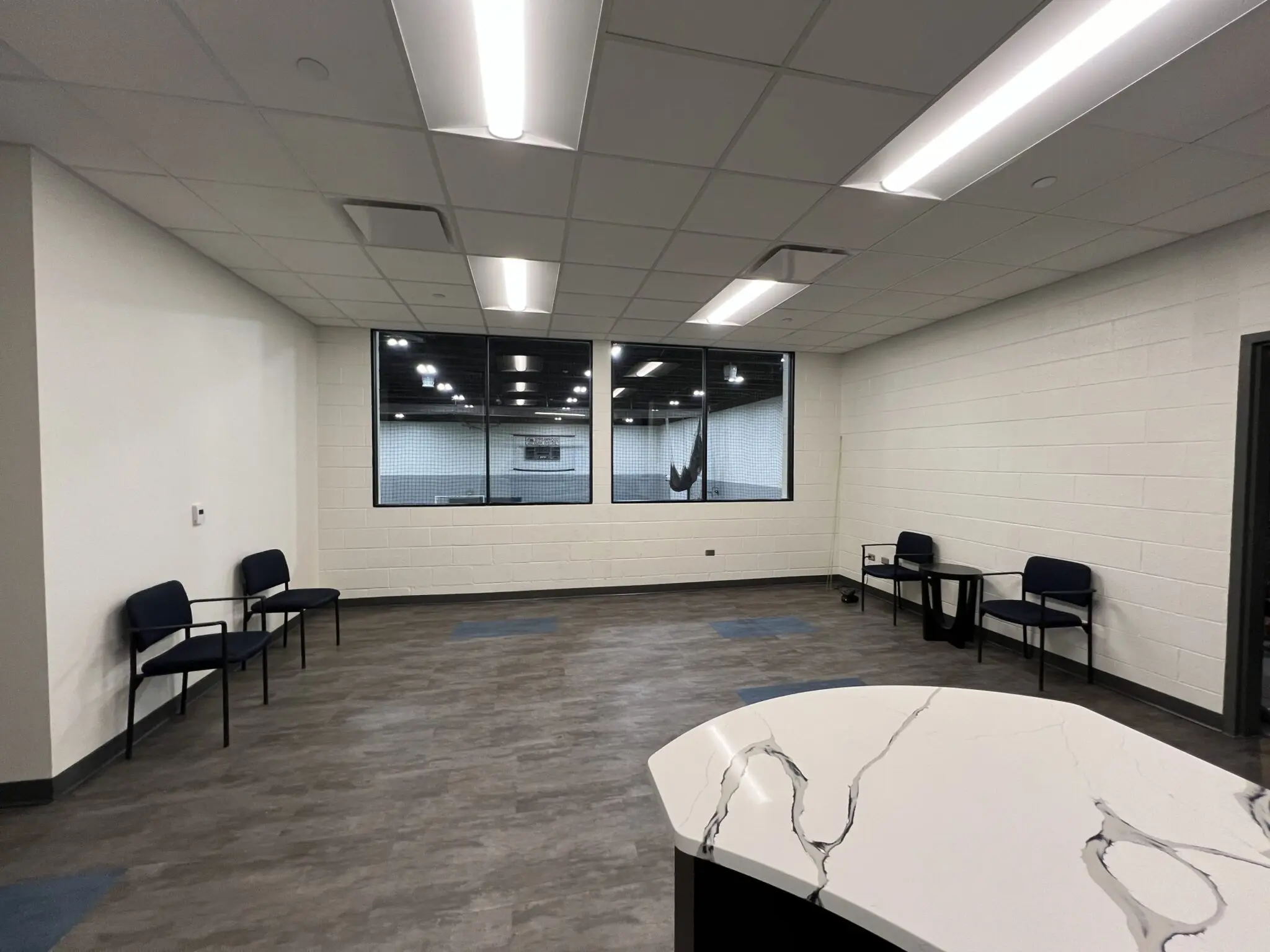 a room with chairs and a table
