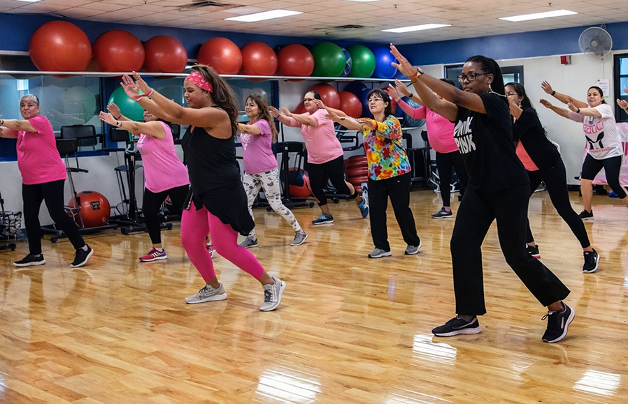 a group of women in a gym