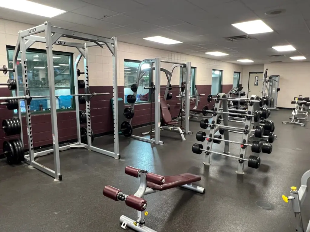 a gym with weights and equipment
