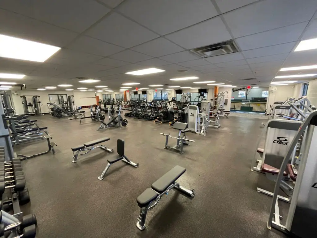 a large room with exercise equipment